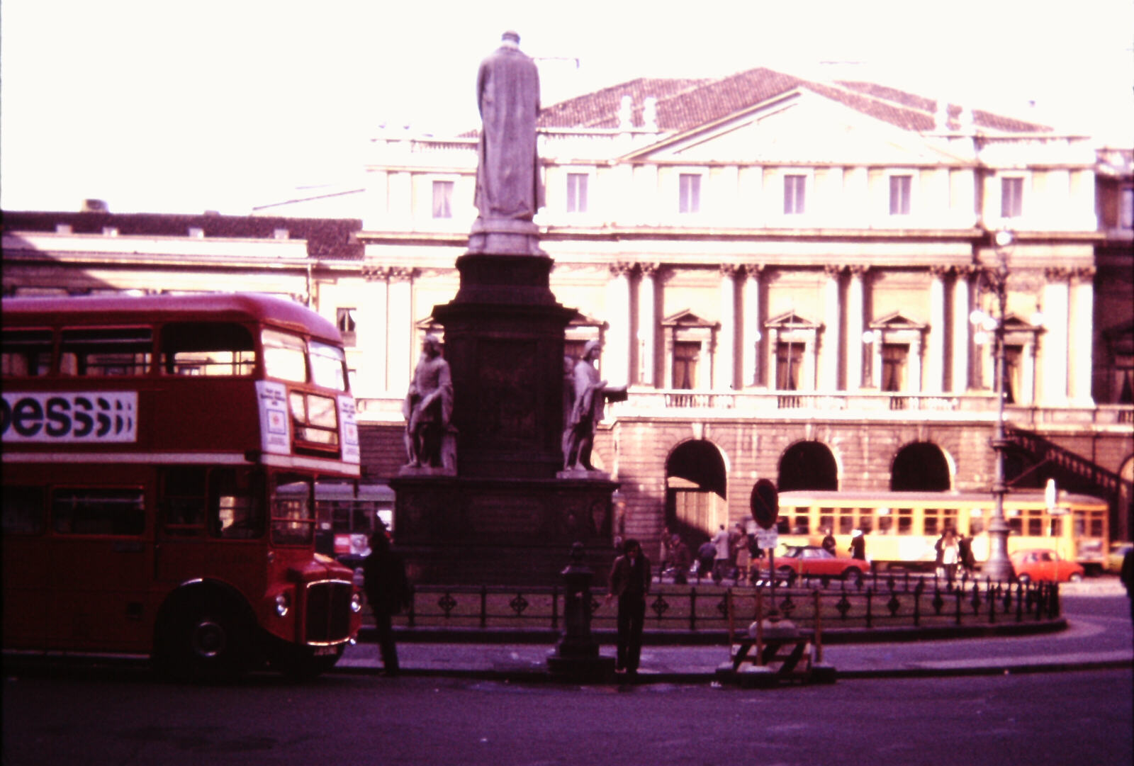 London bus parked outside La Scala, Milan