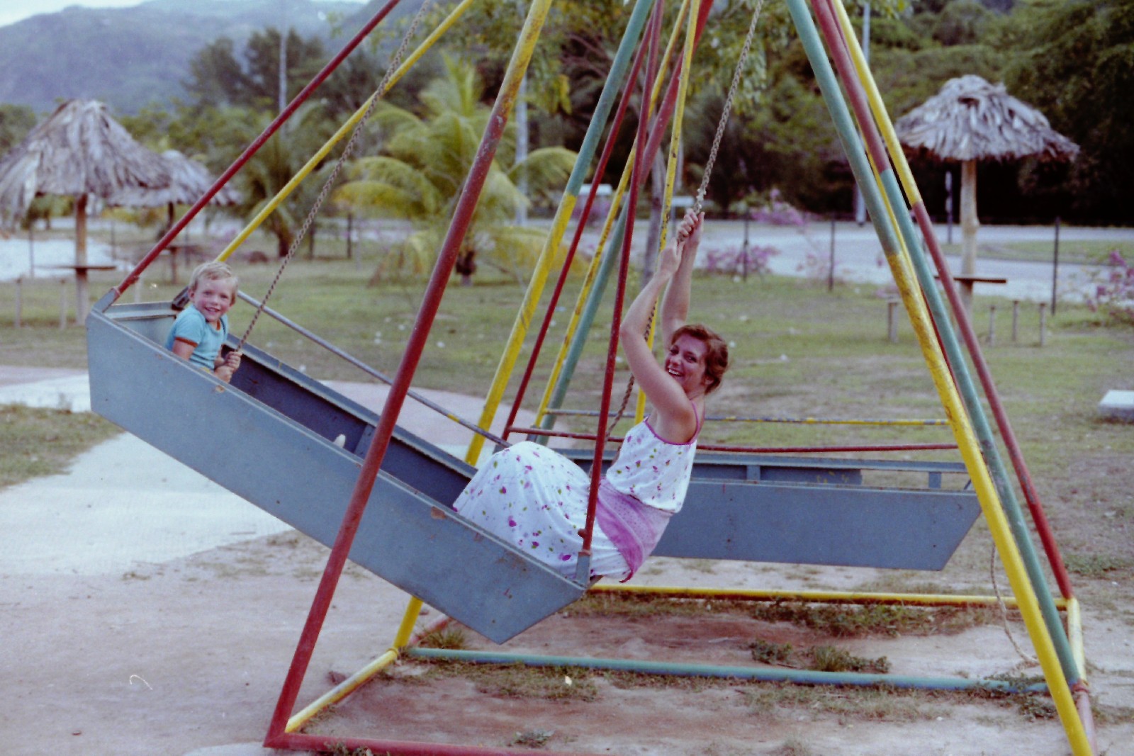 On the swing in a playground in Victoria, Seychelles