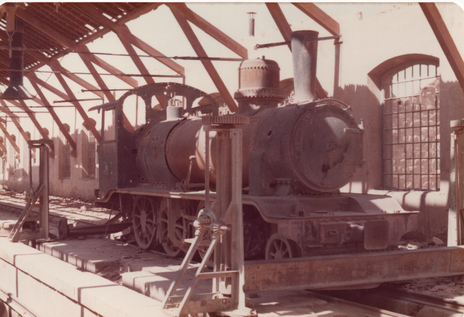 Steam train in the Hejaz railway engine shed at Medain Saleh, Saudi Arabia, in 1980