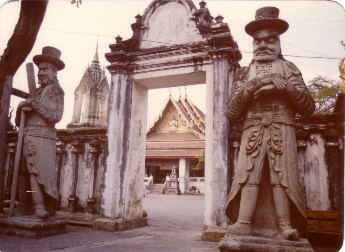 Guardians at the entrance to Wat Pho, Bangkok