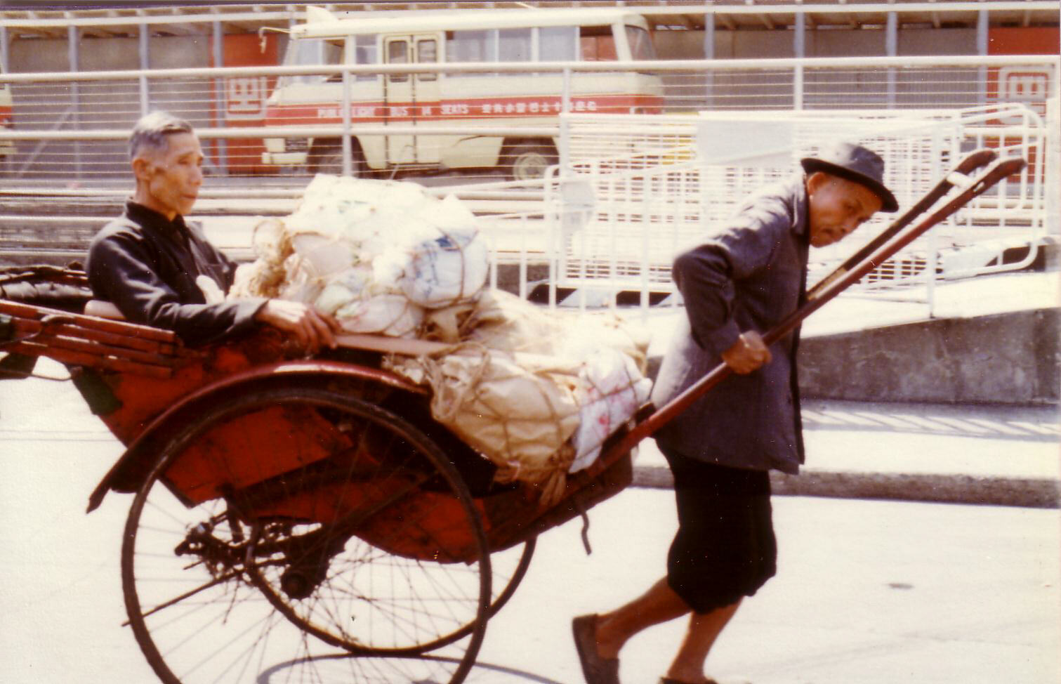 A well-laden rickshaw in Hong Kong