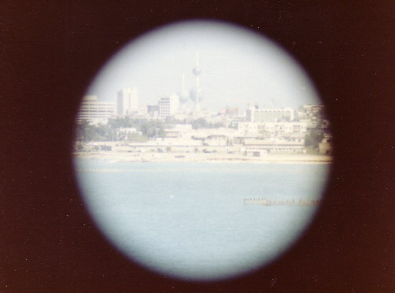 Kuwait city through a porthole of the SS Marriott hotel