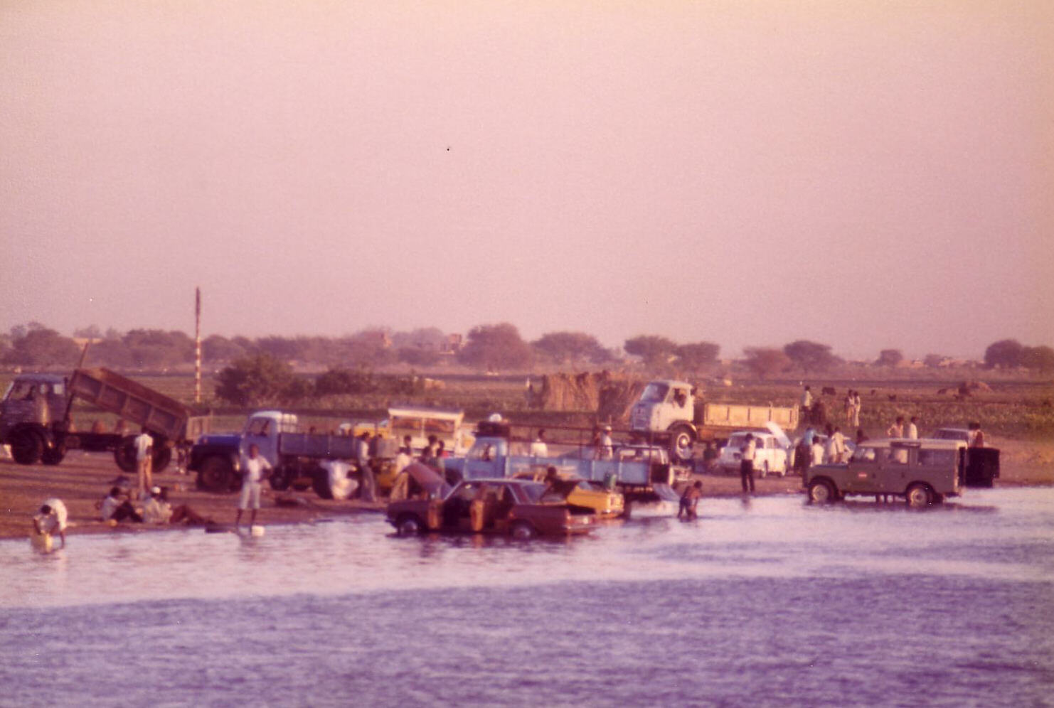 Car wash in the White Nile at Khartoum, Sudan