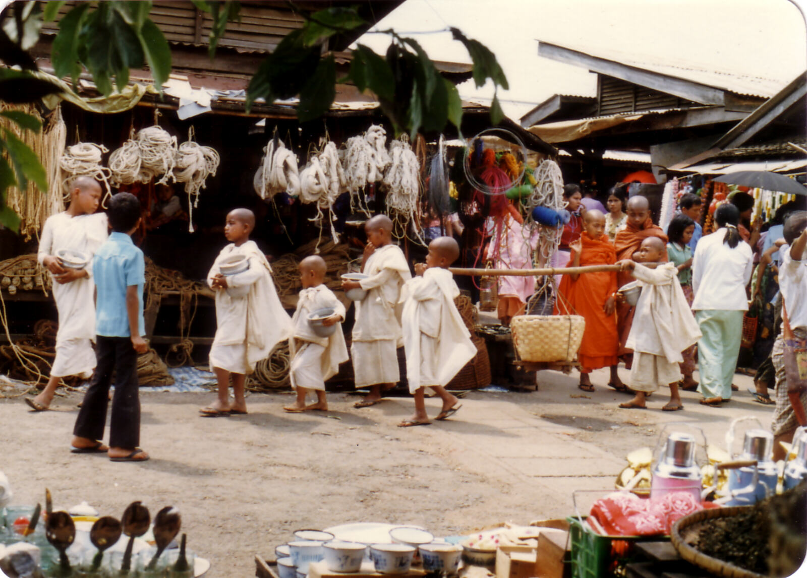 Apprentice monks in the market in Maymyo, Burma