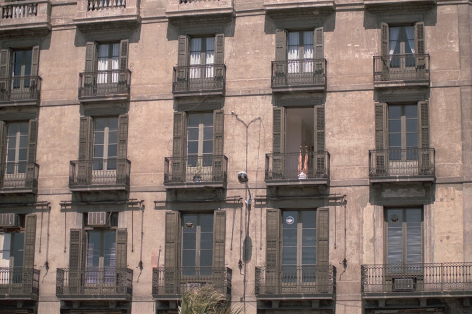 Morning exercises at a window in Barcelona