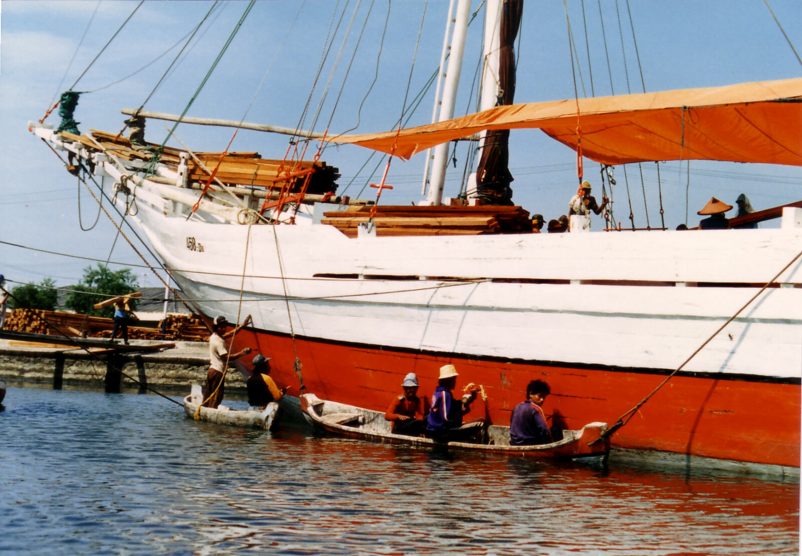 Cleaning one of the ships in the harbour at Jakarta, Indonesia