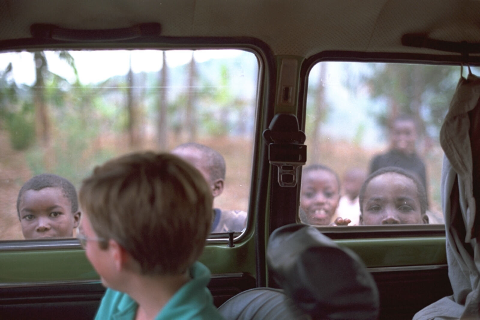 An audience at a roadside stop in Rwanda