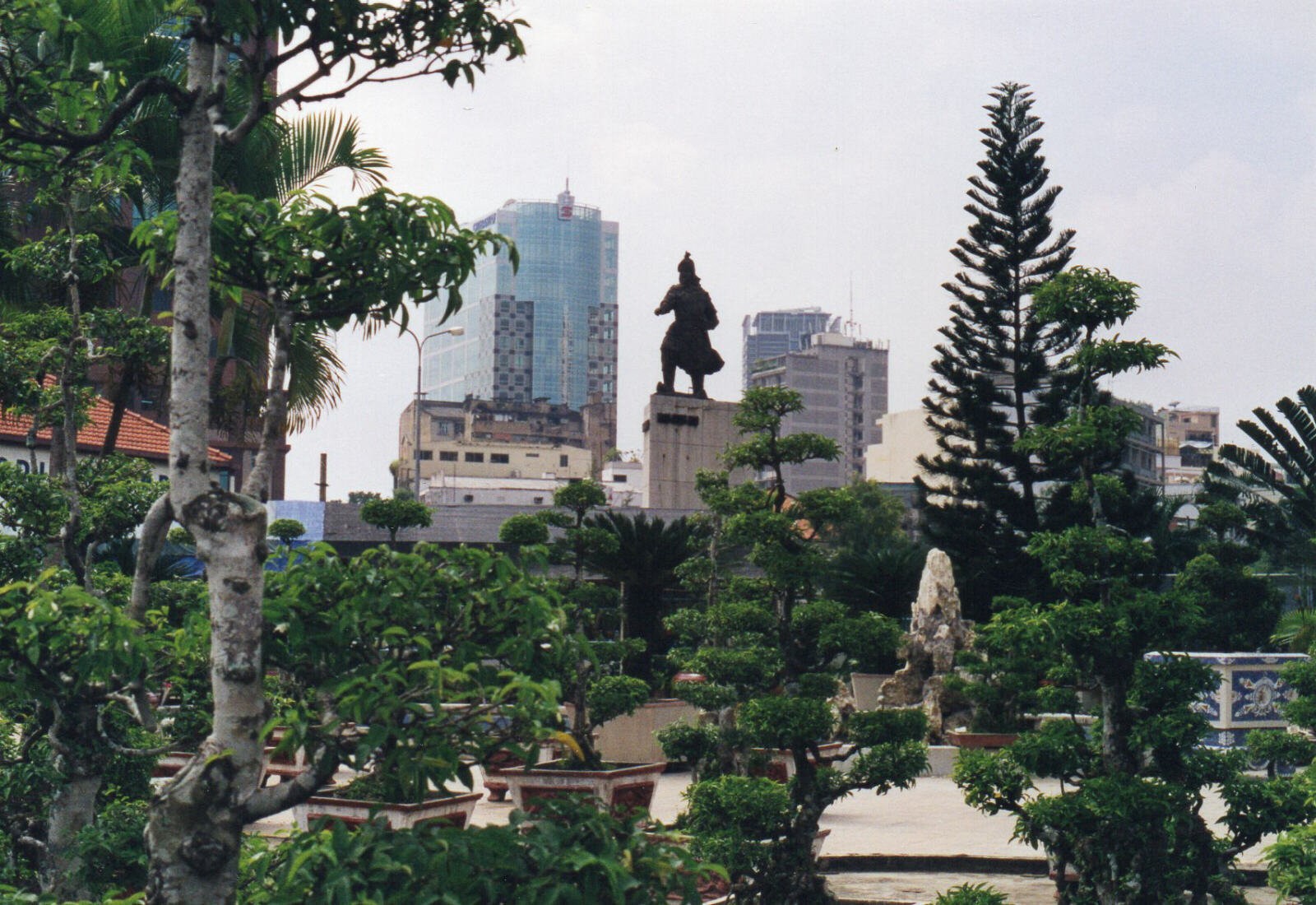 Bonsai garden and Tran Hung Dao statue at Me Linh Square in Saigon, Vietnam