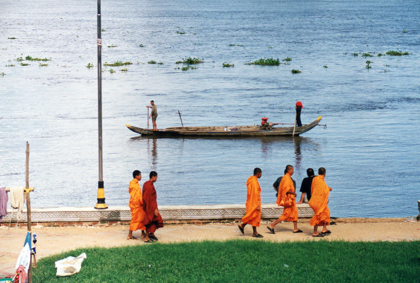 Monks by the Tonle Sap river from the Hotel California, Phnom Penh, Cambodia