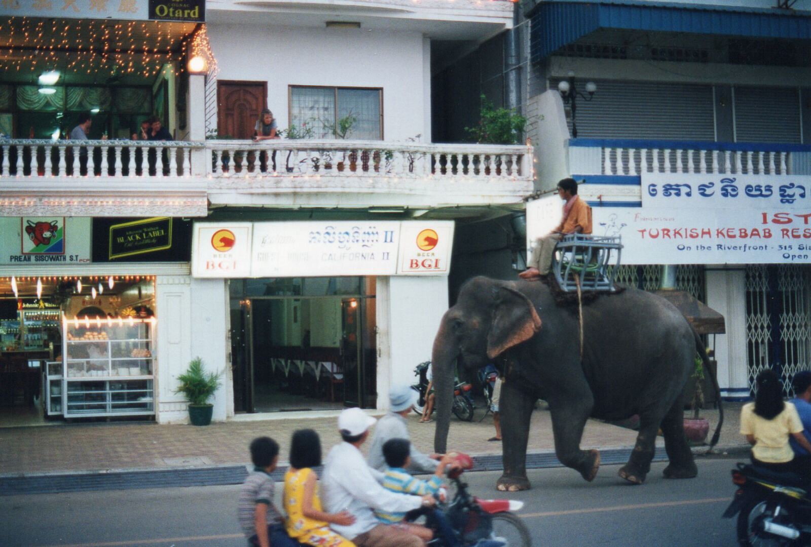 Elephant going past the Hotel California in Phnom Penh, Cambodia