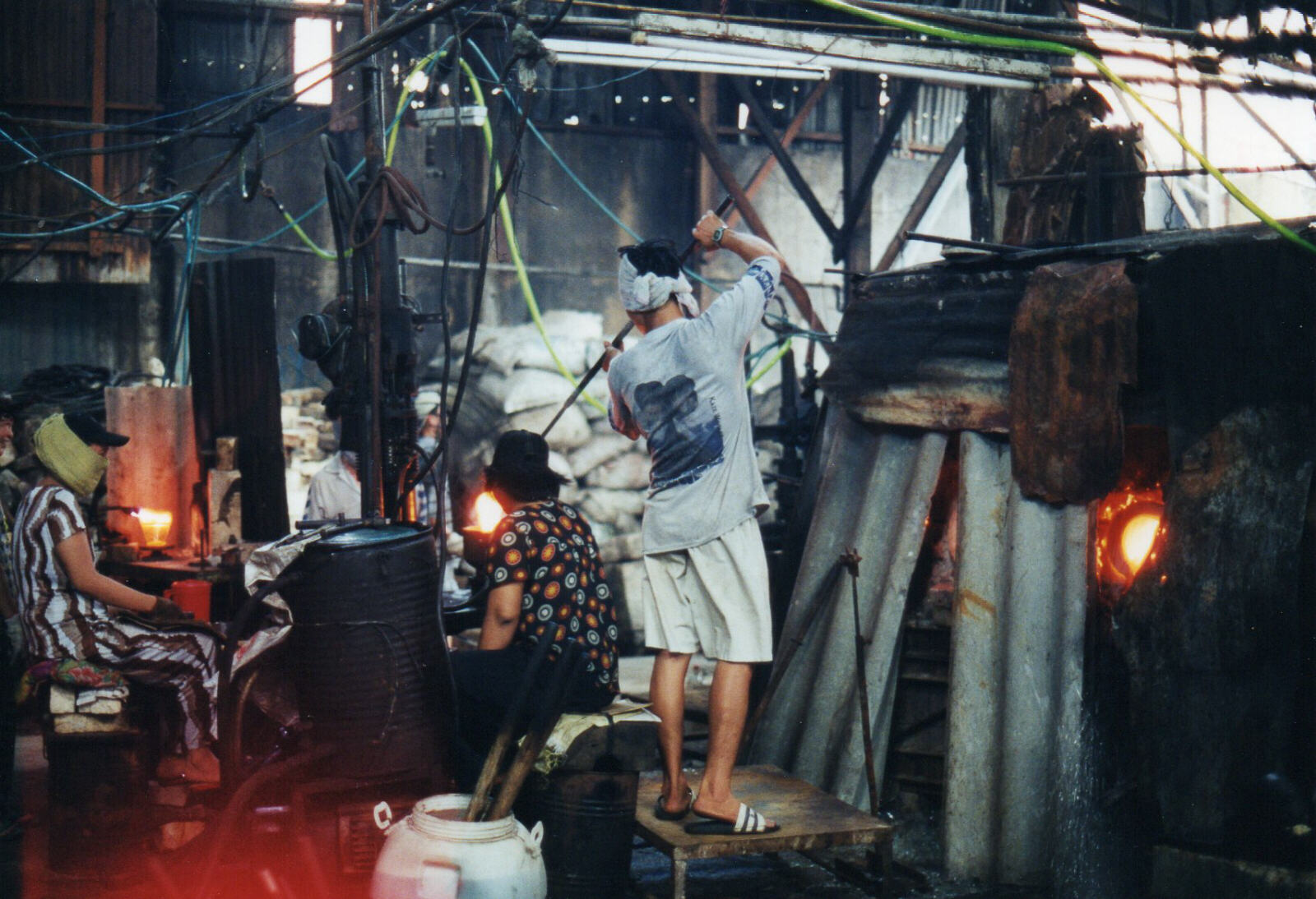 A glass-blowing works in Saigon