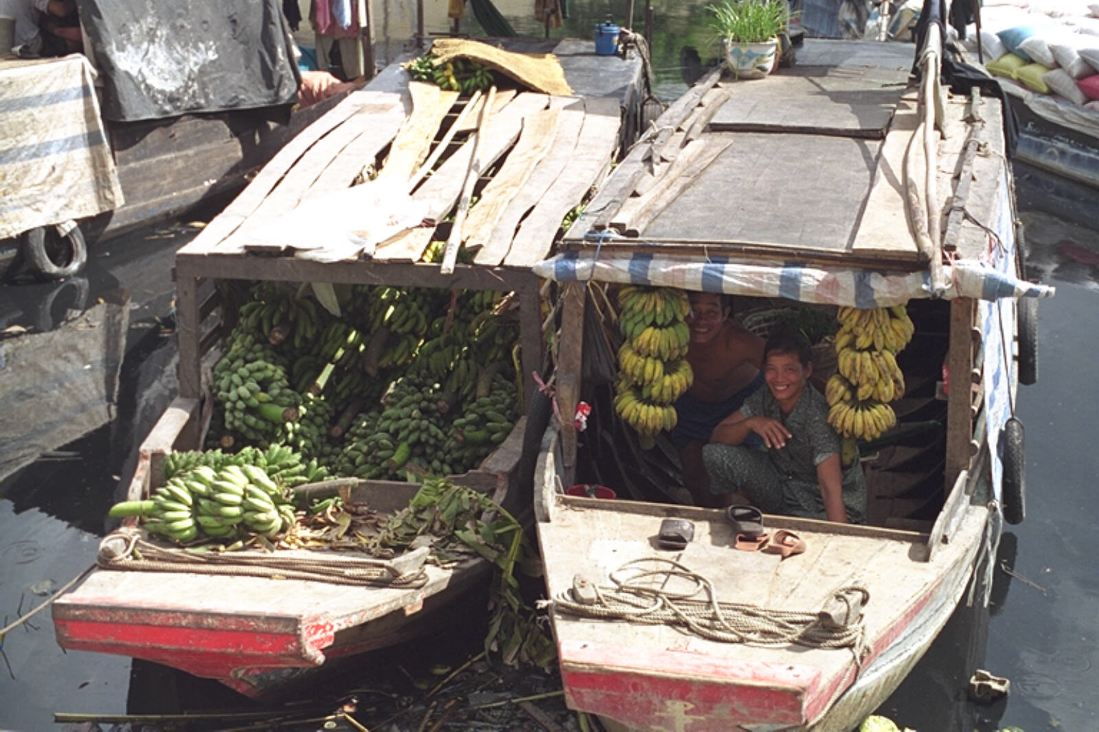 Banana boats on the Black River in Cholon, Saigon