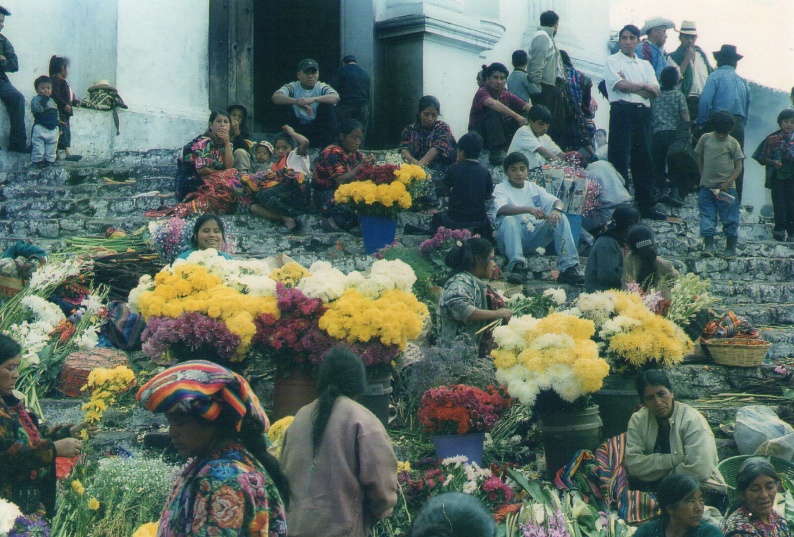 On the steps of St Thomas church on market day in Chichicastenango, Guatemala