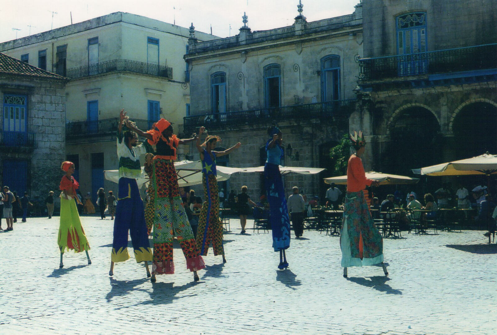 Stilt walkers in Cathedral Square, Havana