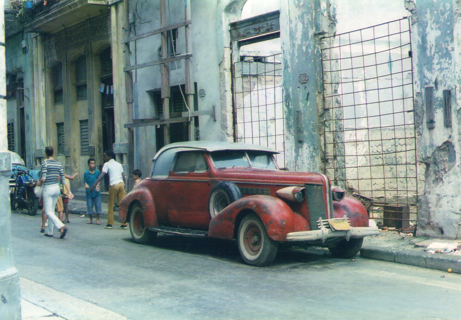 A cassic car parked in Havana old city