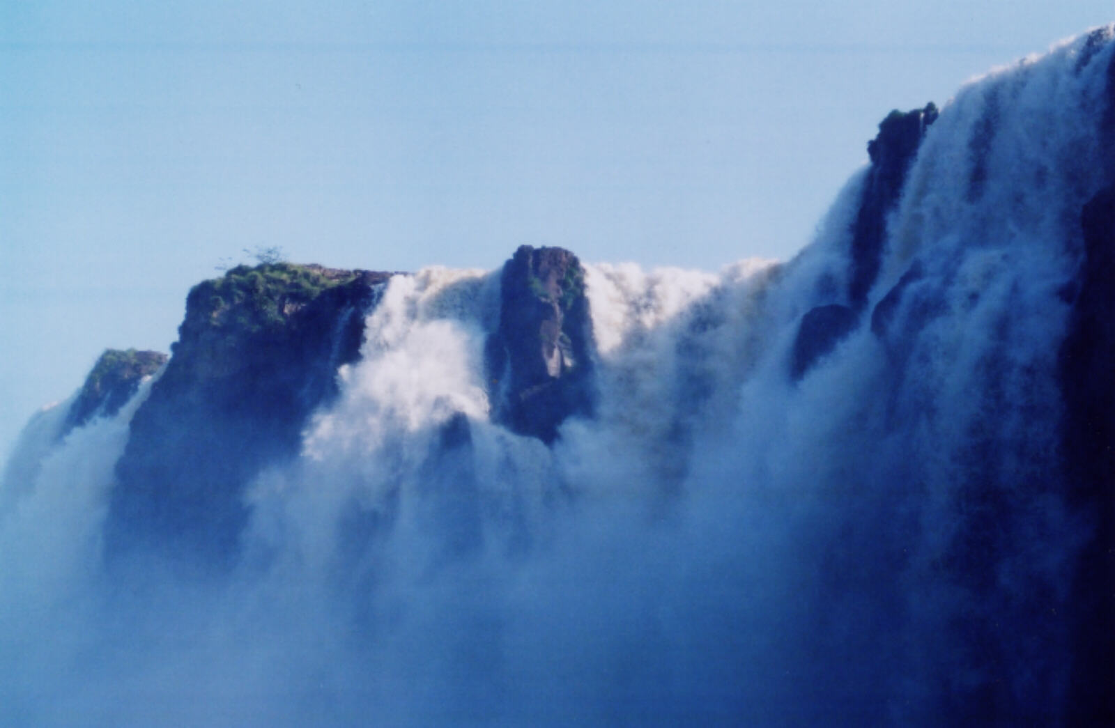 Iguazu Falls from a boat on the river, Brazil / Argentina