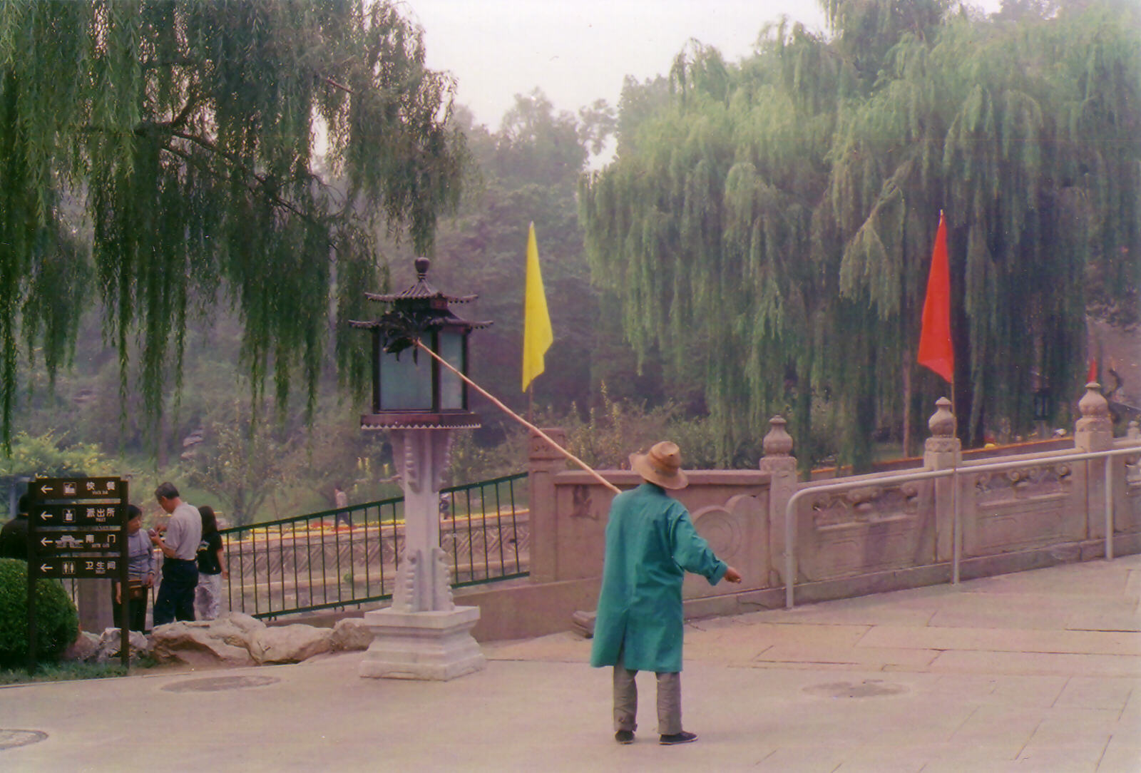 Cleaning the lanterns in Beihai Park, Beijing