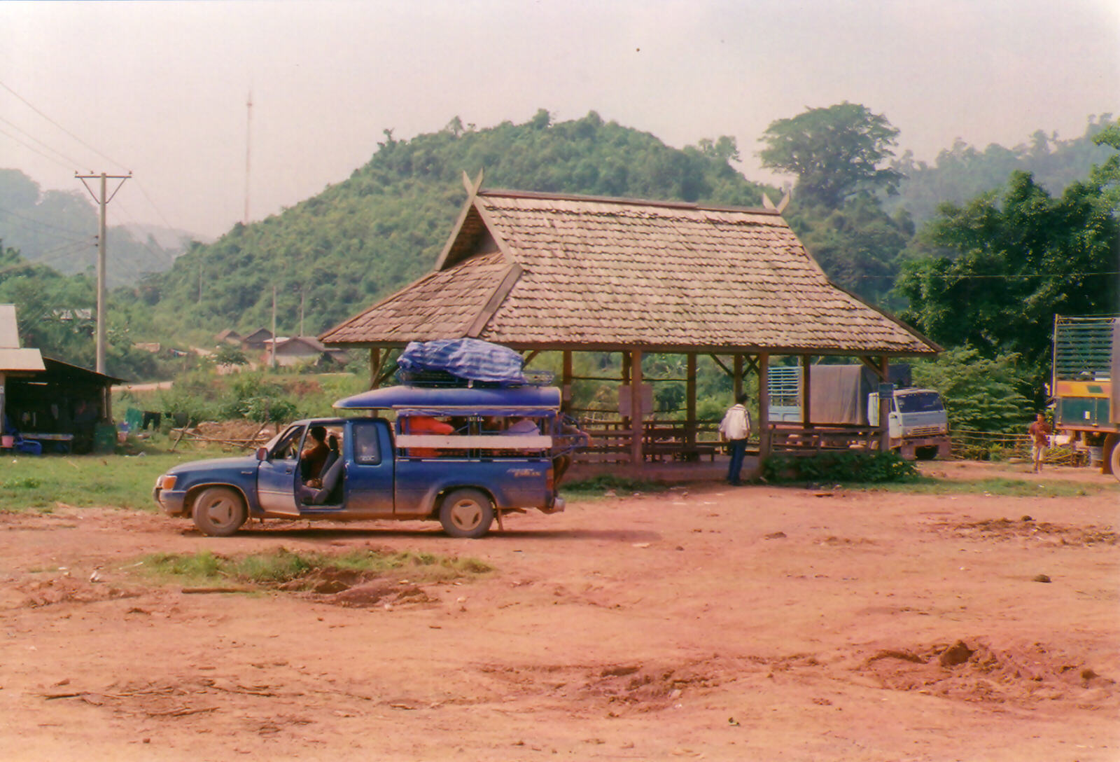 The busy bus station in Boten, Laos