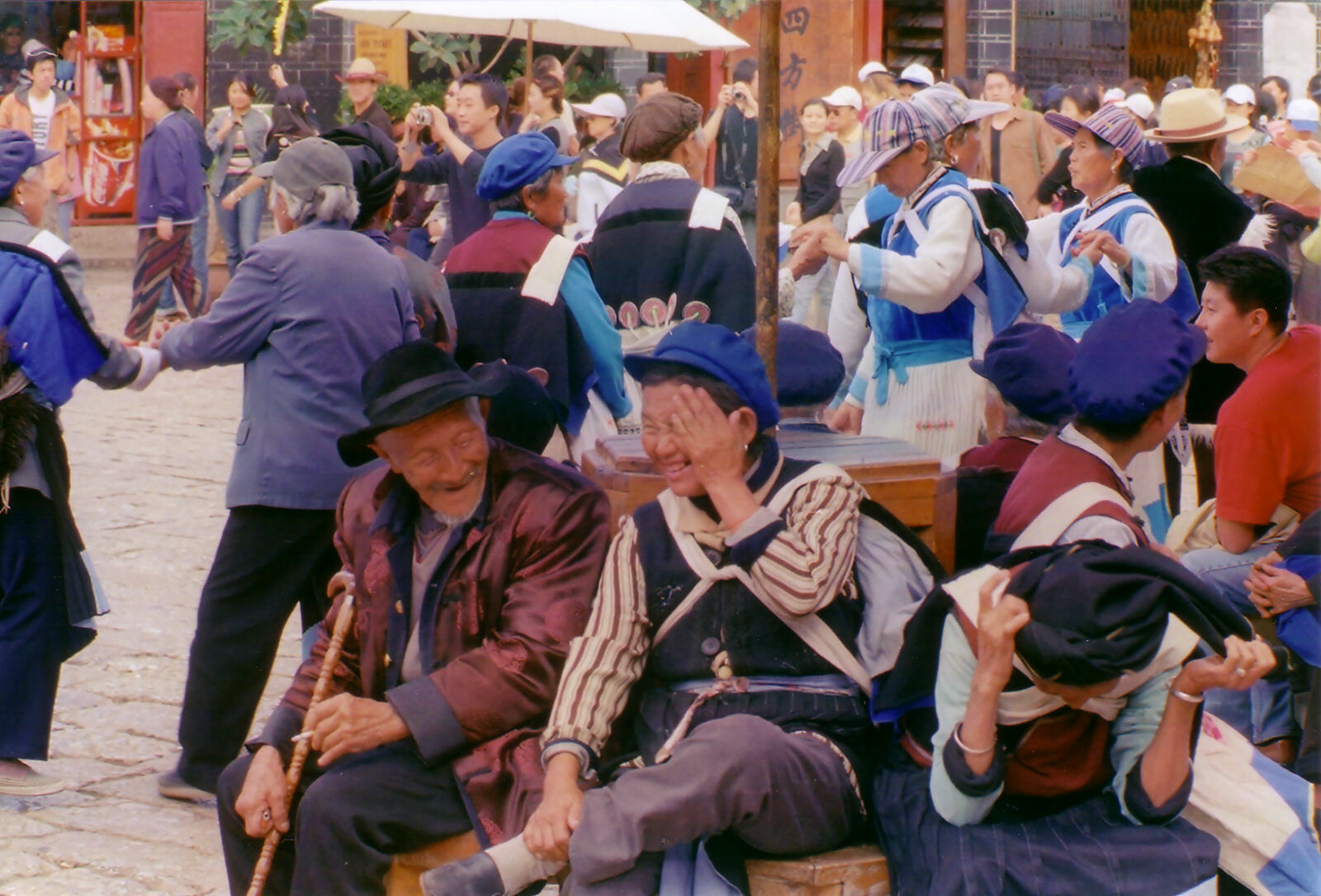 Traditional dancing in the market square in Lijiang, China