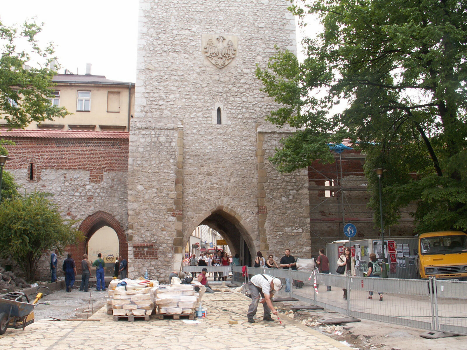 Replacing the cobblestones at Florianska Gate, Krakow