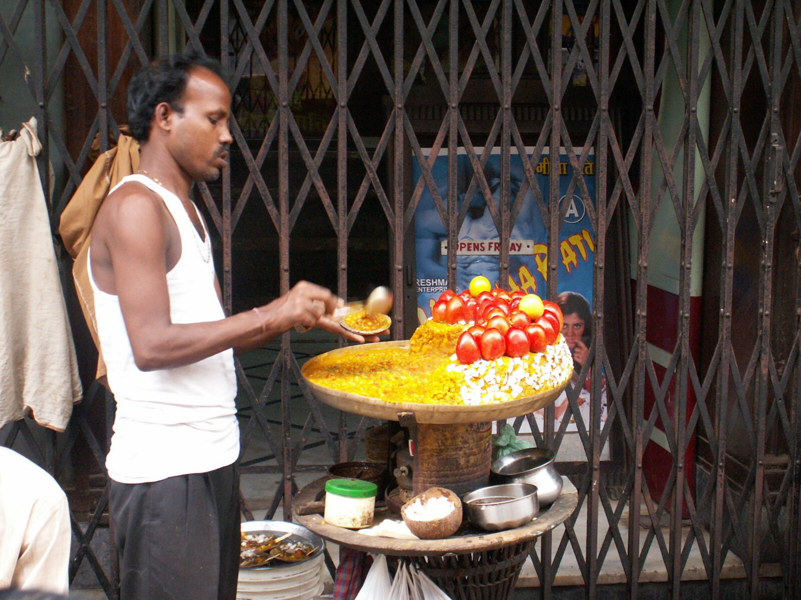 A spicy bean vendor in a street in Calcutta