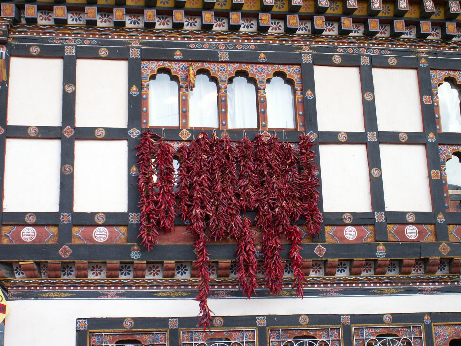 Chillies drying on a house in Paro town, Bhutan