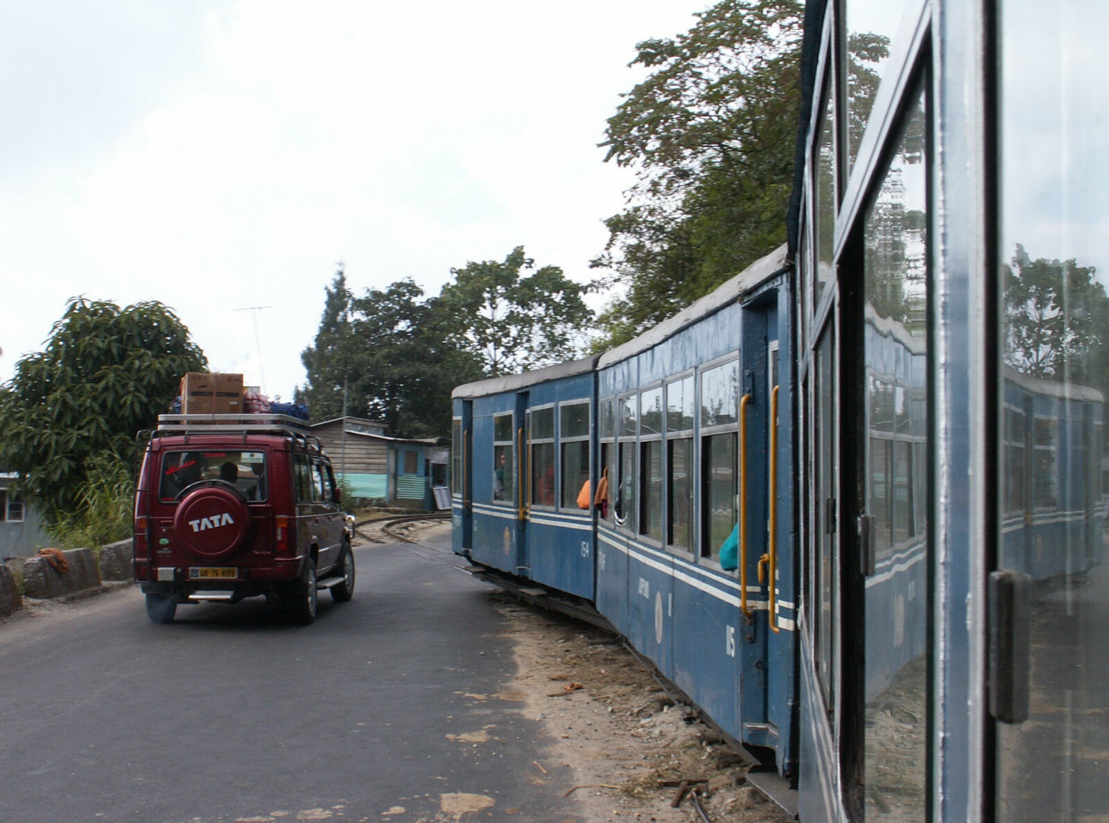 The Darjeeling Himalayan Railway (Toy Train) crossing a road