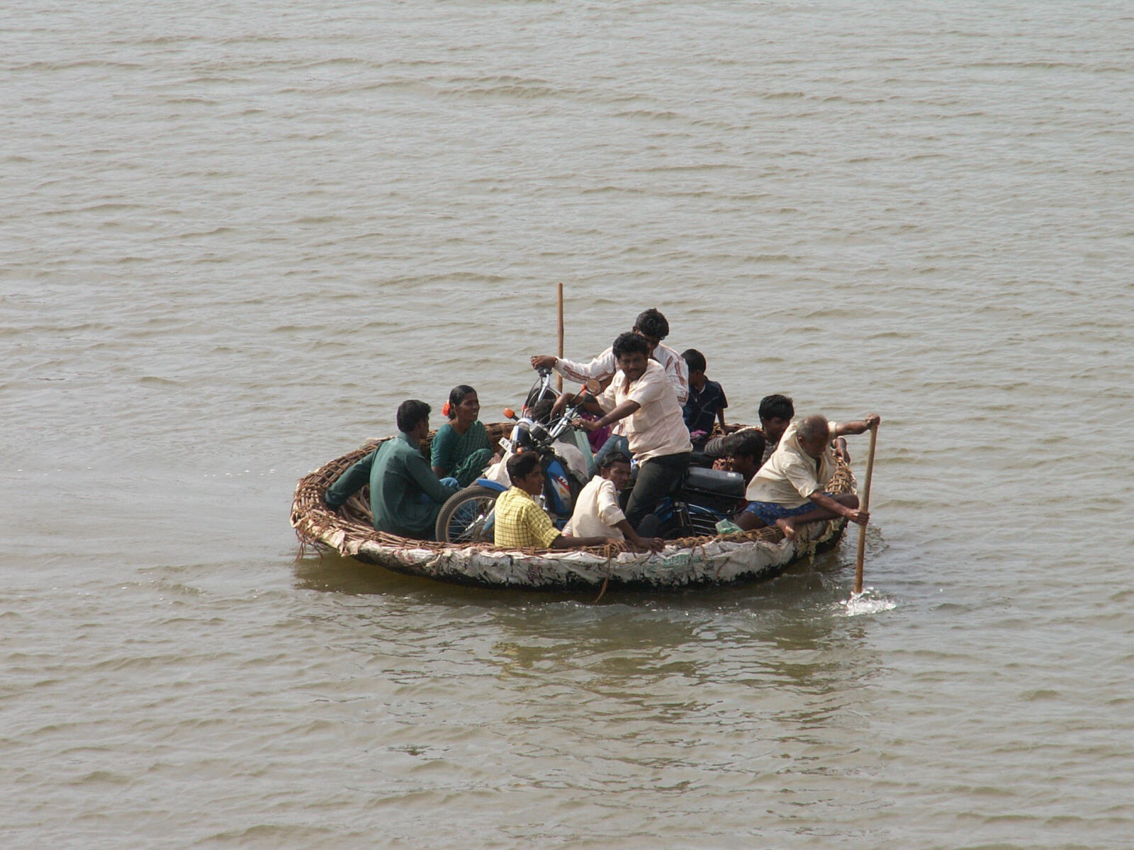 A coracle ferry crossing the river near Hampi, India