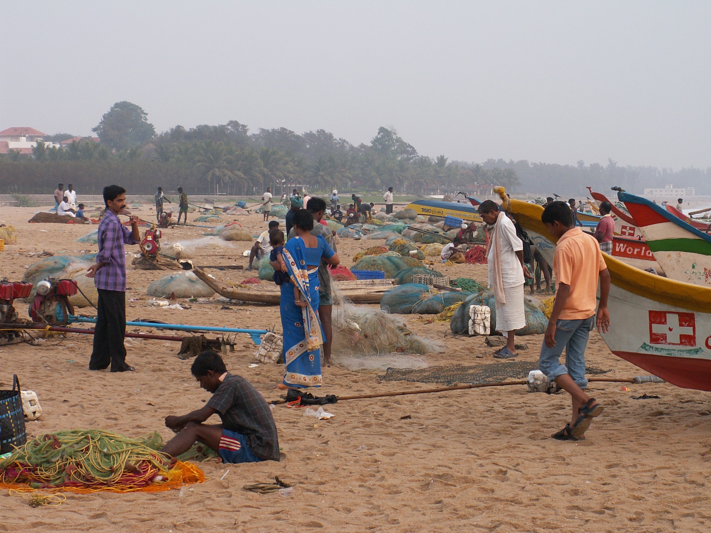 Fishermen on the beach at Mahabalipuram, Tamil Nadu