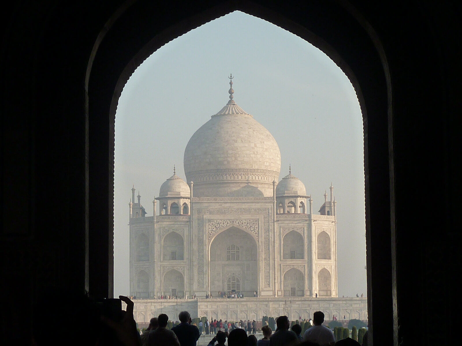 The Taj Mahal through an entrance gateway
