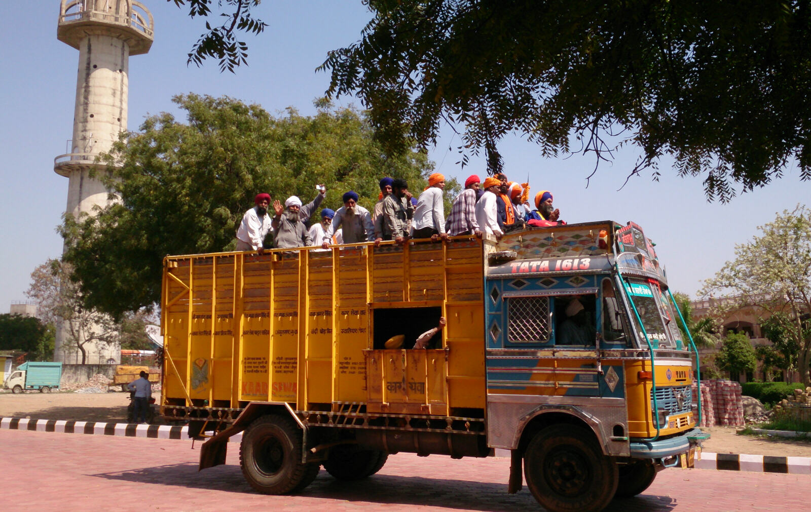 Sikhs in a lorry arriving at a Gurudwara in Gwalior
