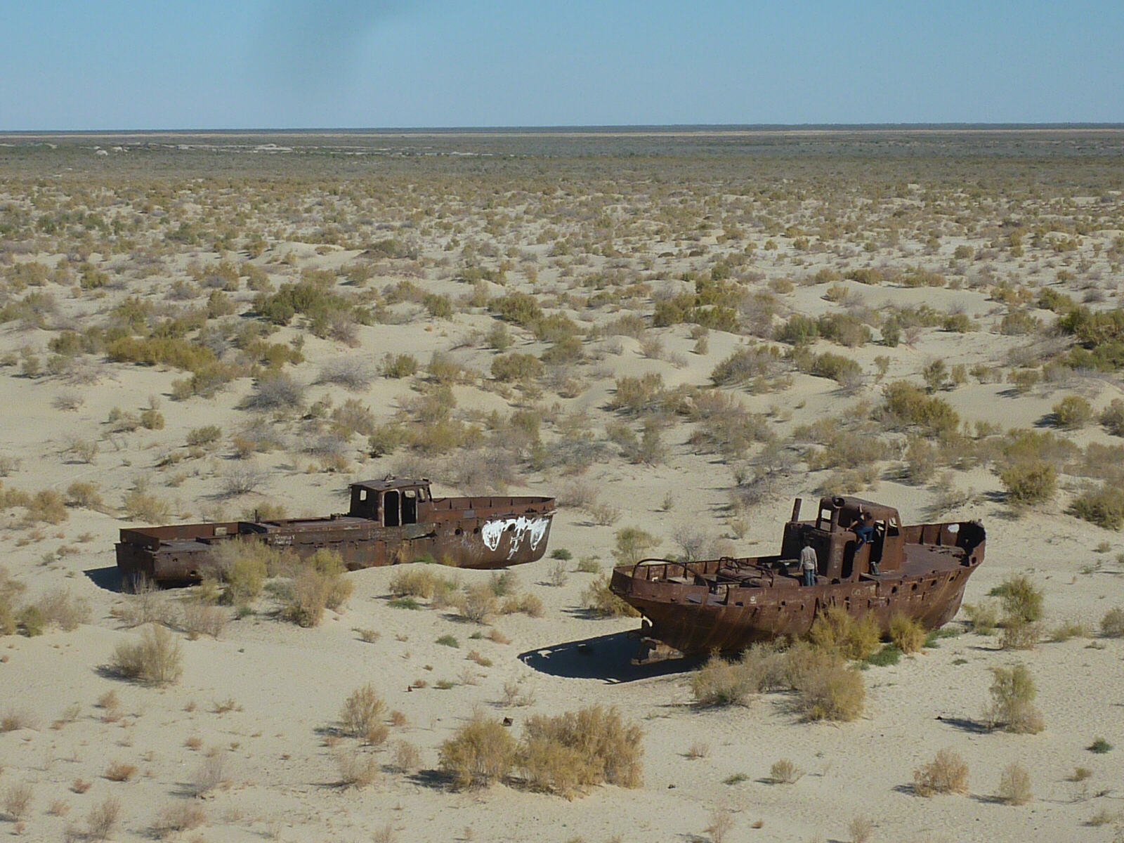 Rusting ships in the port at Moynaq, where the Aral sea used to be, Uzbekistan