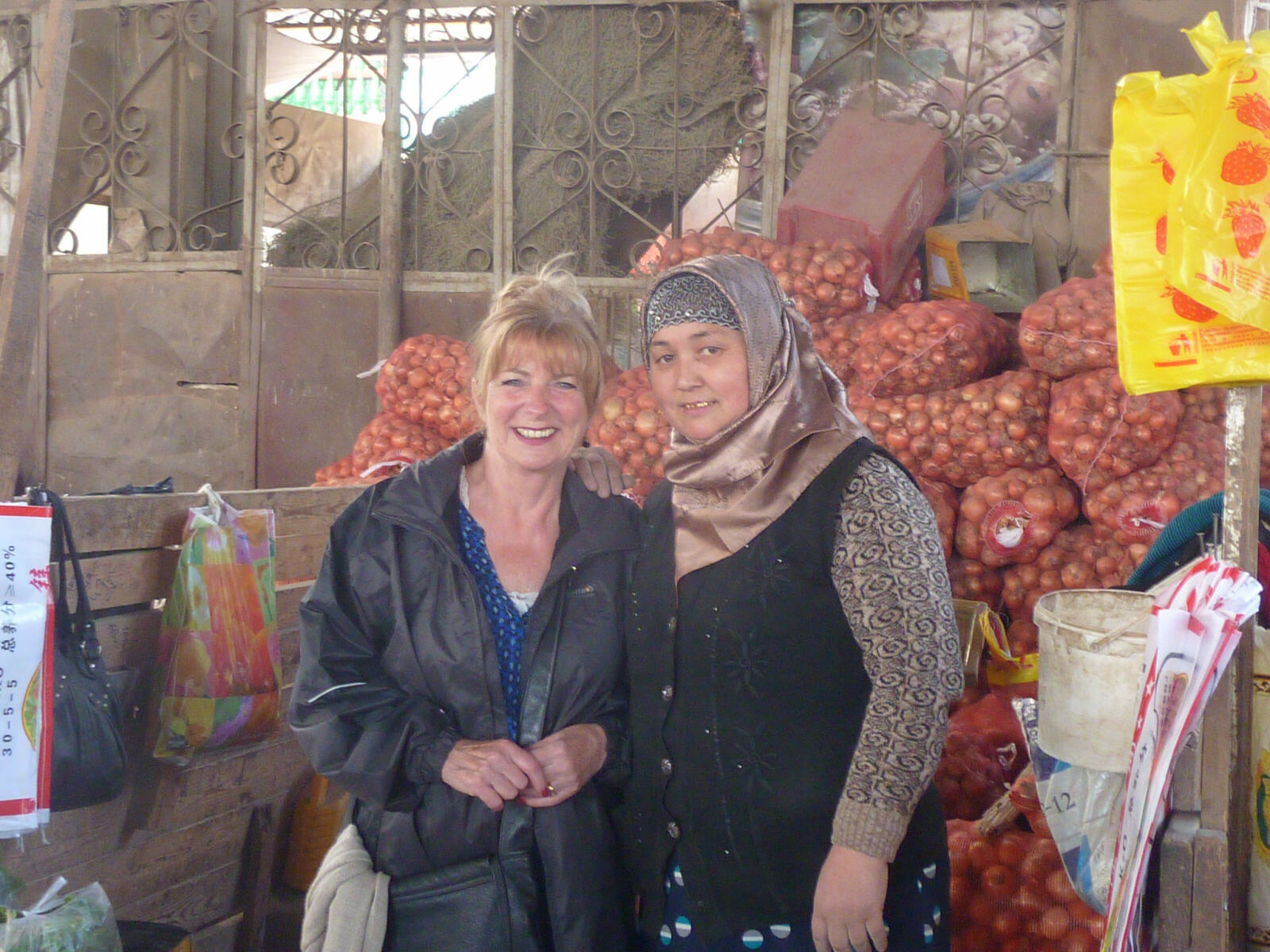 An onion-seller in Panjshanbe bazaar, Khojand, Tajikistan