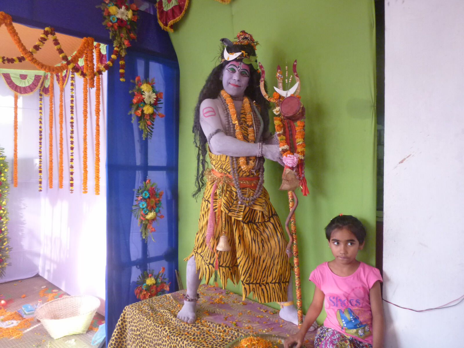 Living Shiva statue at a festival in Agartala, India