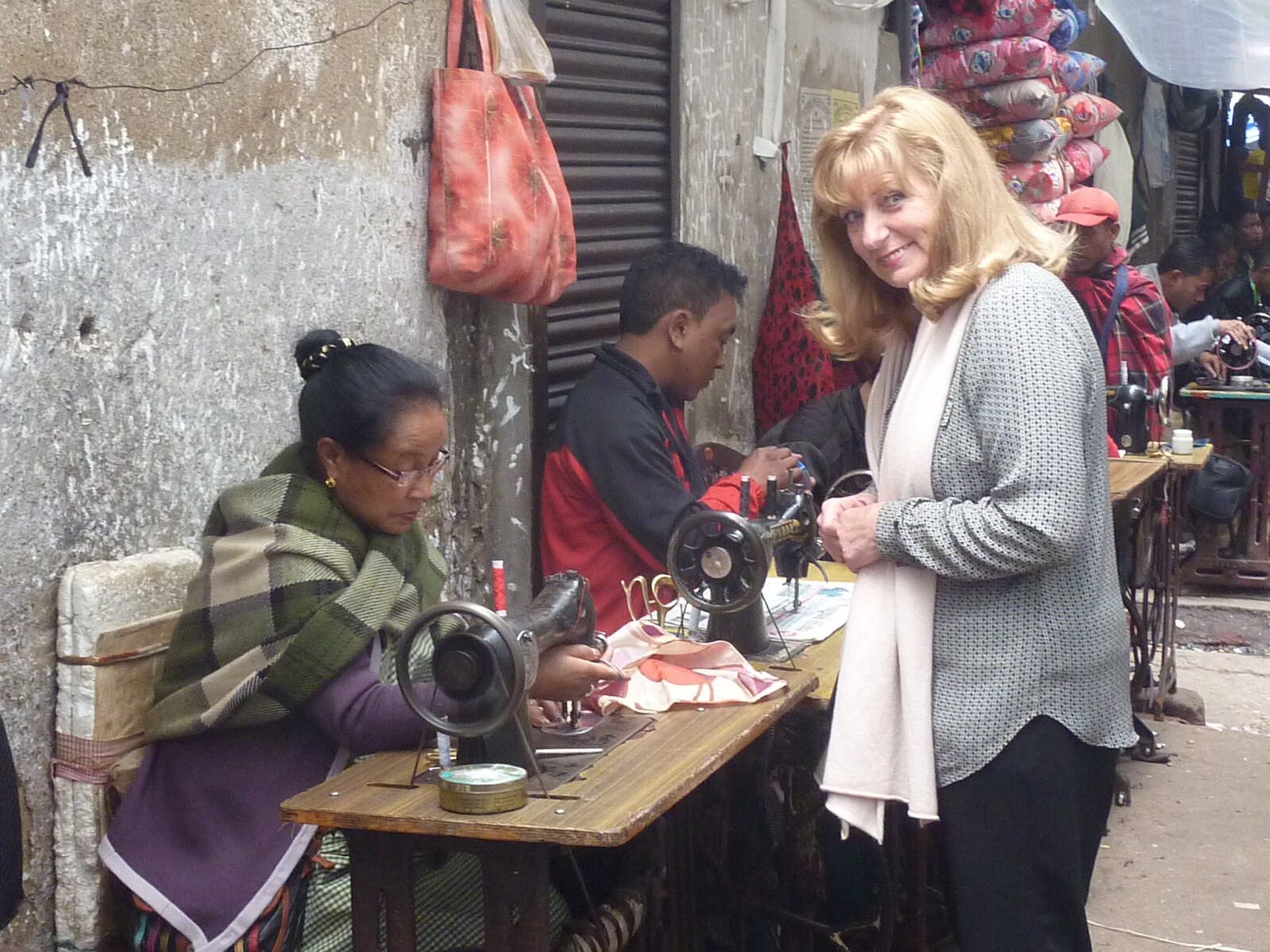 Clothes mending in Shillong bazaar, Meghalaya state