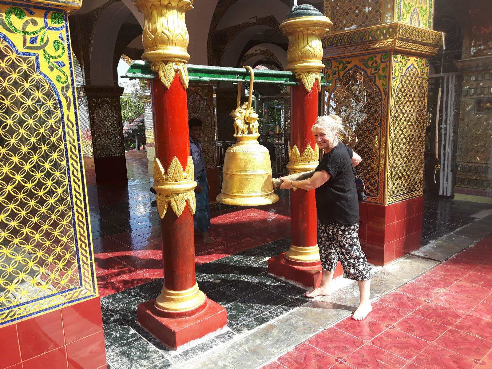 Ringing the bell at the top of Mandalay Hill