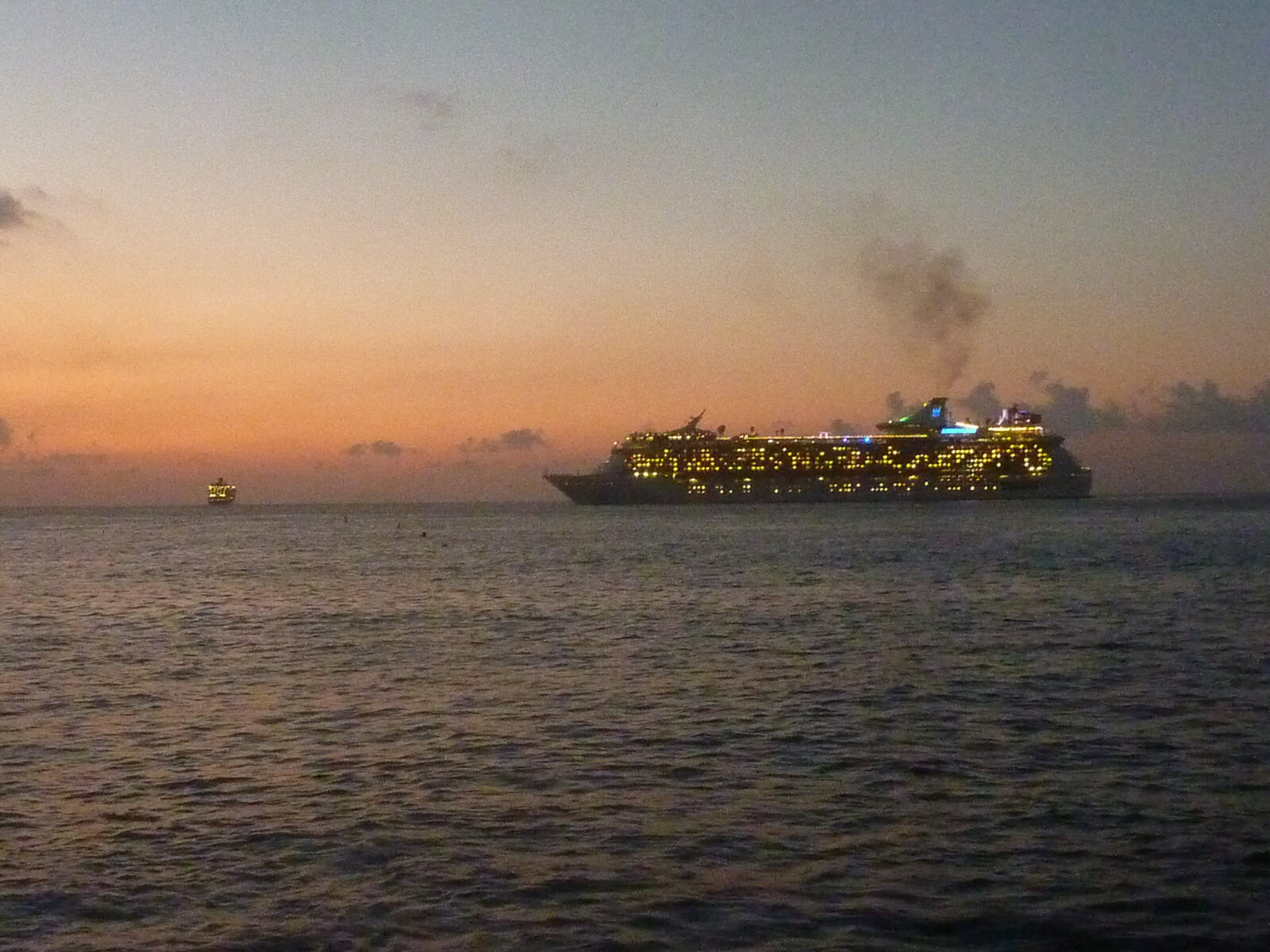 Cruise ship leaving Georgetown, Grand cayman at sunset