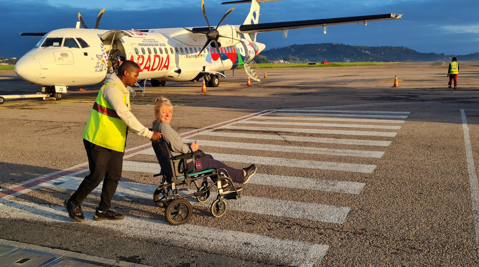 Sheila in a wheelchair at Fort Dauphin airport