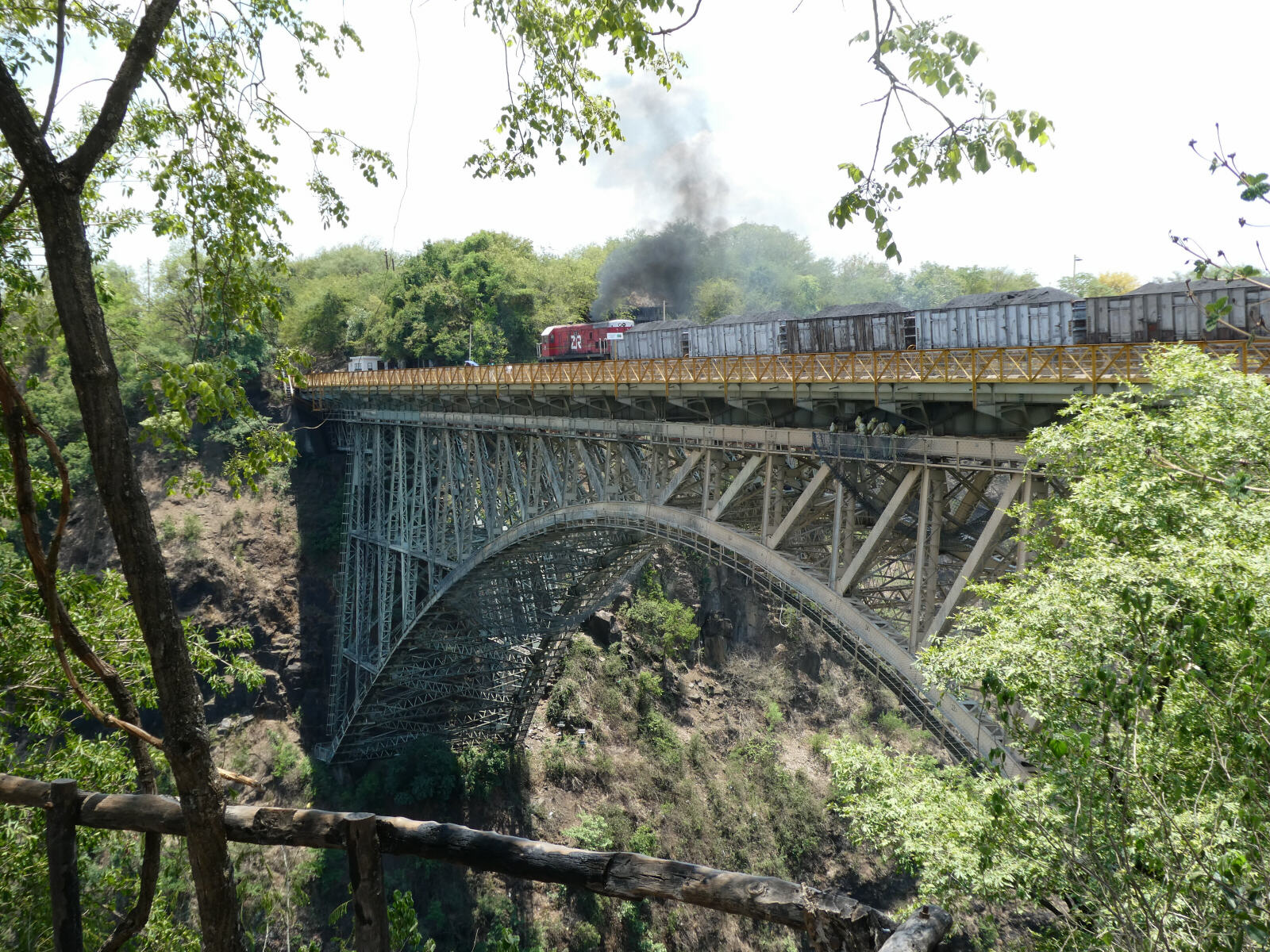 A train crossing the Victoria Falls bridge from Zimbabwe to Zambia