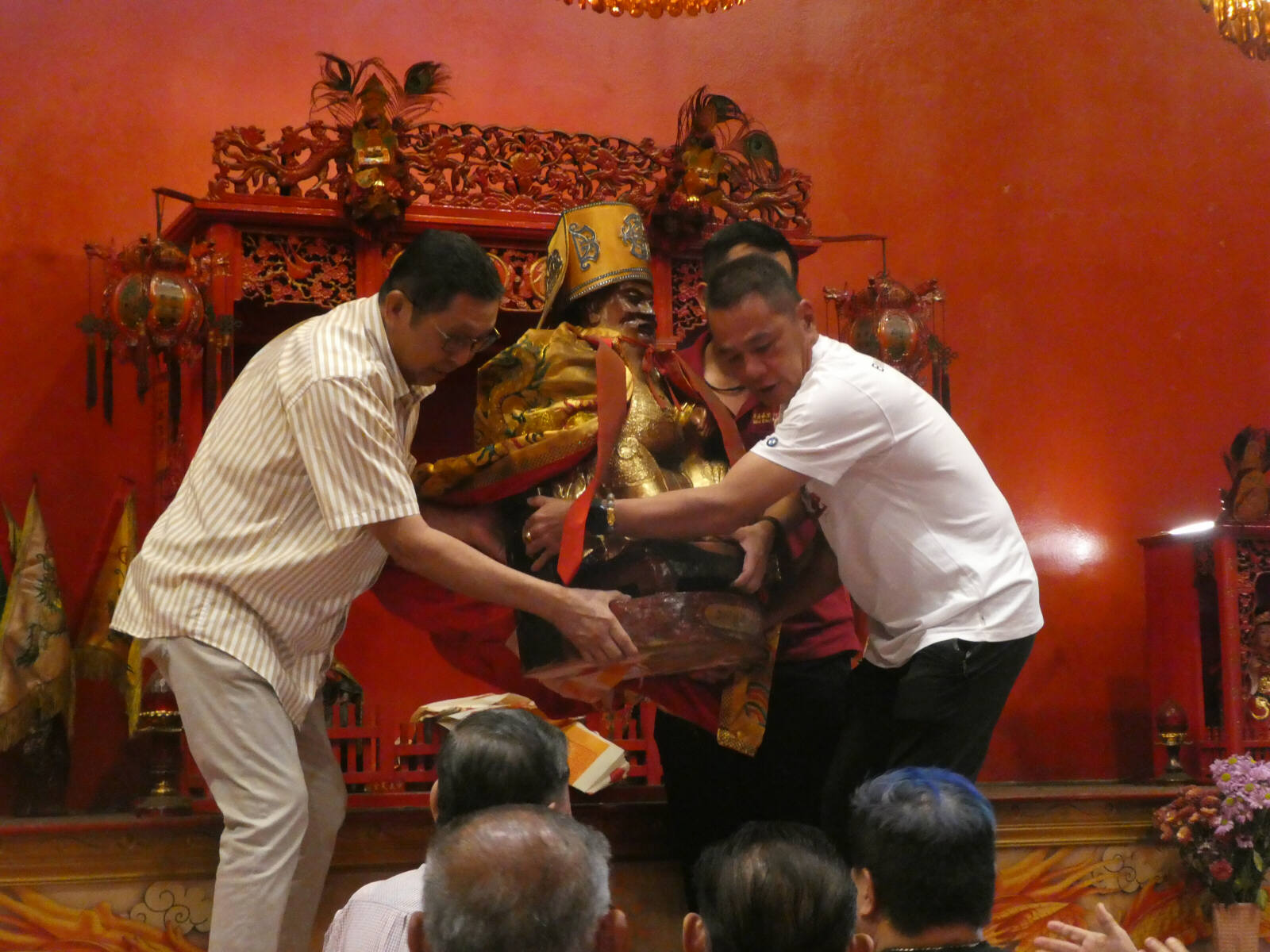 Moving the deity in the Tua Pek Kong temple in Sibu, Sarawak