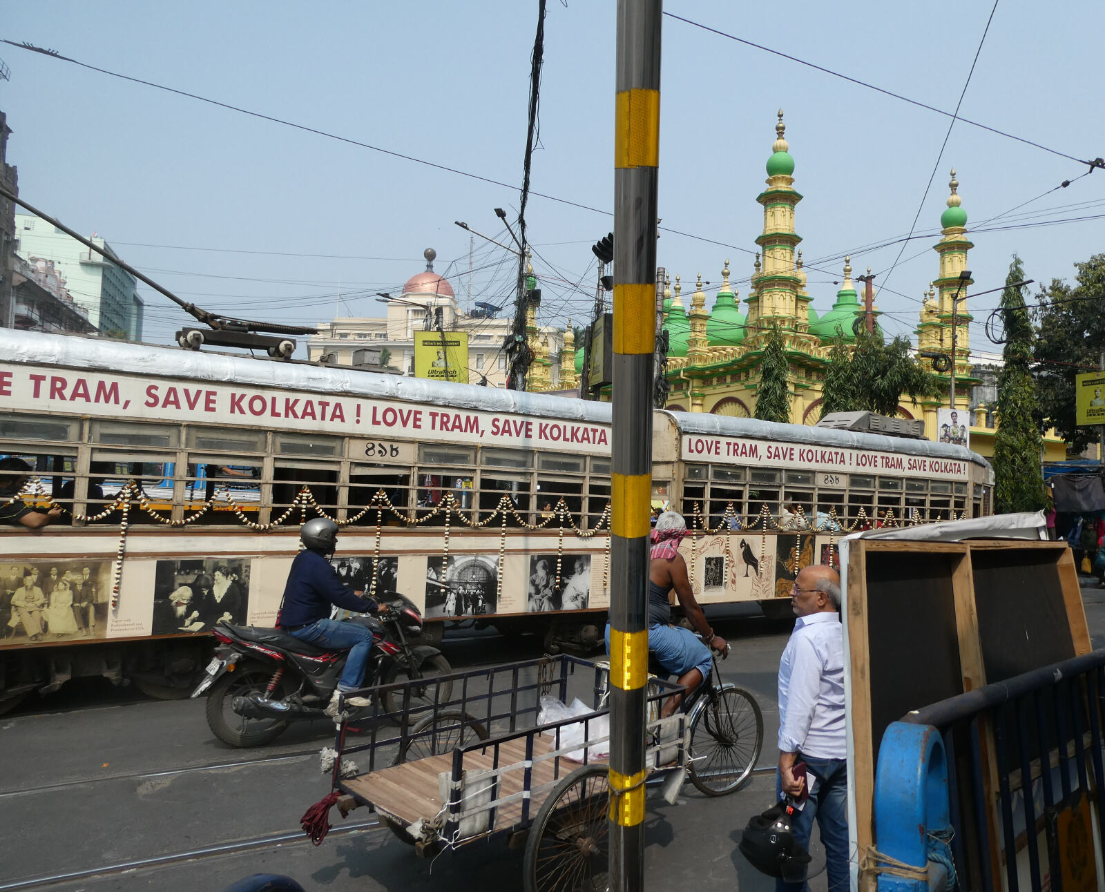 A tram passing Tipu Sultan mosque in the centre of Calcutta, India A tram passing Tipu Sultan mosque in the centre of Calcutta, India