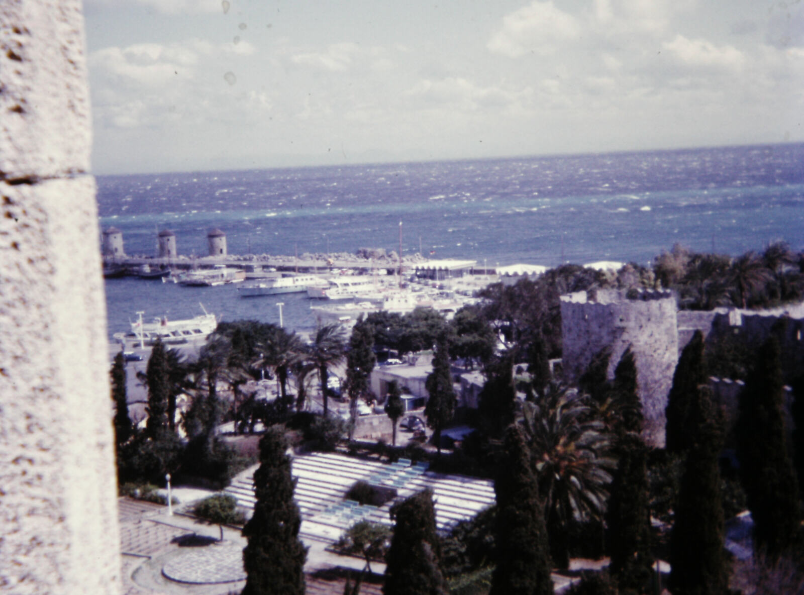 Mandraki harbour looking east from a window of the museum in Rhodes in 1971